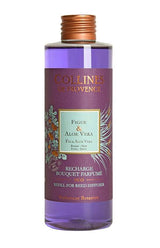 Collines de Provence Duftdiffuser-Nachfüllung Feige und Aloe Vera in transparenter Flasche mit violetter Flüssigkeit und violettem Etikett auf hellem Hintergrund.