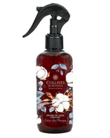 Wäschespray von Collines in der Duftrichtung Baumwolle in brauner Plastikflasche und schwarzem Zerstäuber