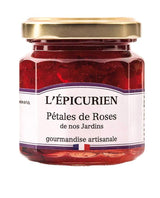 L'Épicurien Rosenblüten-Gelee aus Gartenrosen im Glas mit goldfarbenem Schraubdeckel.