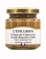 L'Épicurien Steinpilzcreme mit weißem Sommertrüffel im Glas mit goldfarbenem Schraubdeckel.