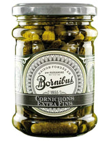 Bornibus Extra feine Cornichons im Glas mit silberfarbenem Schraubdeckel.