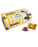 Bruntz Schokoladentrüffel in Kougelhopf-Form mit Orange, Verpackung und einzelnem Trüffel
