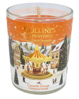 Collines de Provence Duftkerze Zimt-Orange 75gr im geöffneten Glas mit sichtbarem Holzdocht und weihnachtlich gestaltetem Etikett