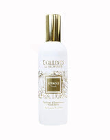 Collines de Provence Raumspray Neroli in weißer Flasche mit goldfarbenem Verschluss und floral gestaltetem Etikett als Freisteller auf hellem Hintergrund