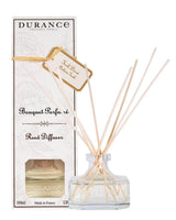 Durance Duftdiffuser Goldenes Teak  Glasflakon mit Holzstäbchen vor Verpackung Raumduft aus Frankreich
