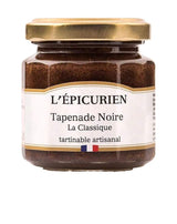 L'Épicurien Klassische schwarze Tapenade im Glas mit goldfarbenem Schraubdeckel.